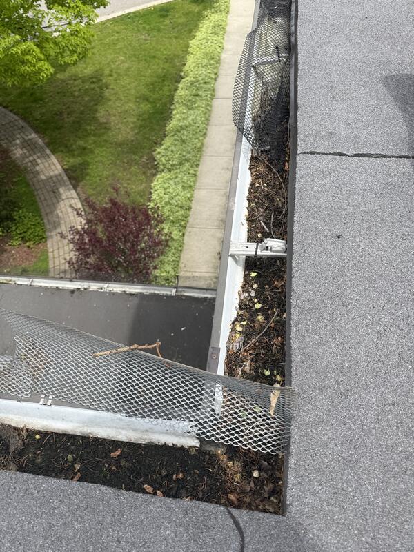 Flat roof gutter corner — before